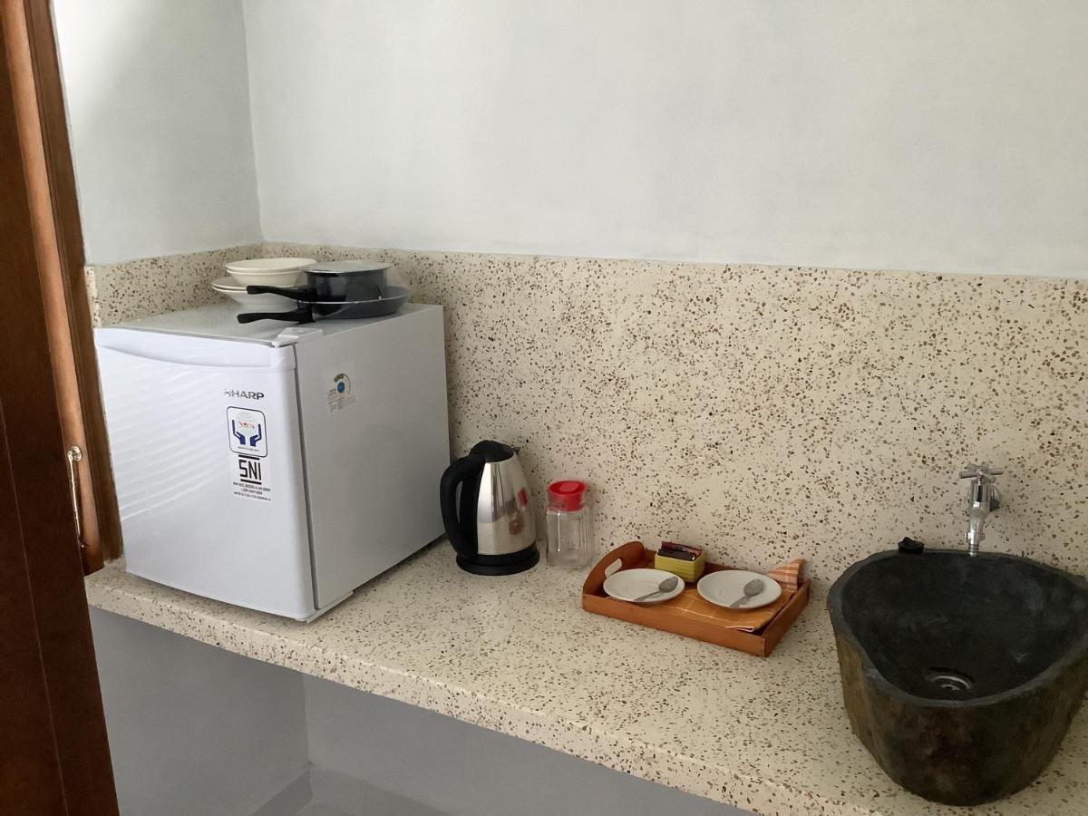 Villa Iris Homestay Улувату Екстер'єр фото